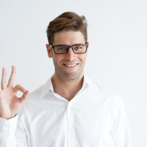 portrait-successful-young-businessman-showing-ok-sign